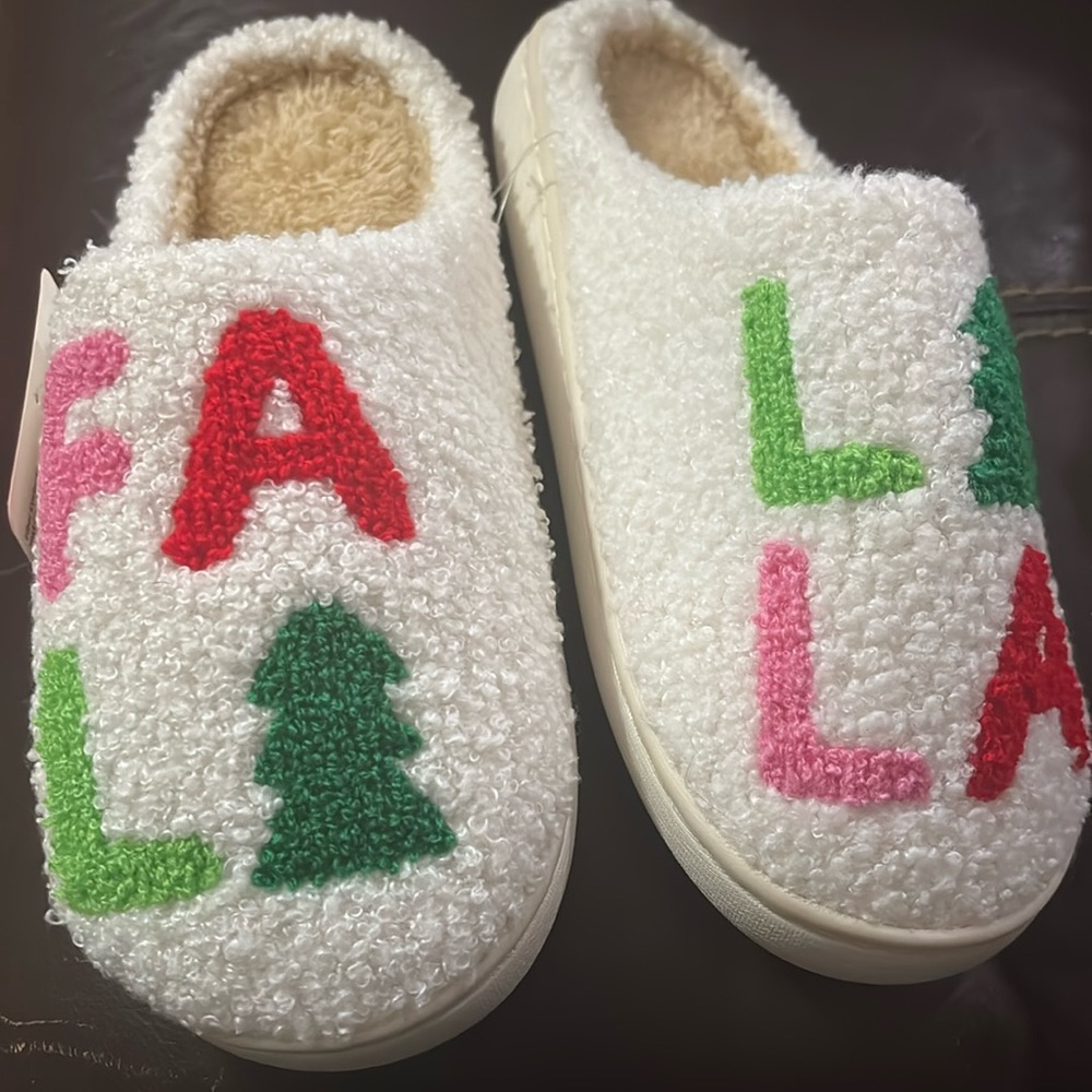 Brand new Christmas slippers. Size small 5-6 women